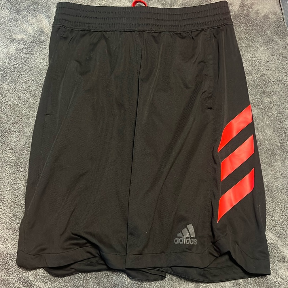 Adidas red and black shorts